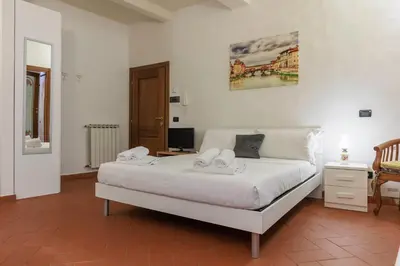 Letto o letti in una camera di Santa Croce Cozy House