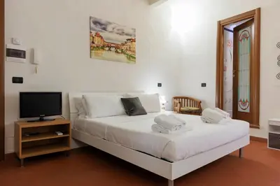 Letto o letti in una camera di Santa Croce Cozy House