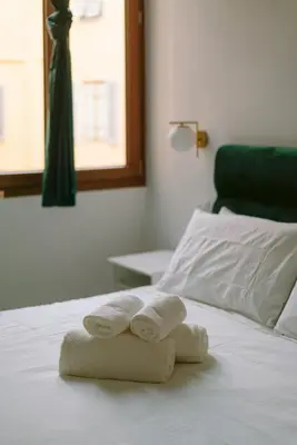 Letto o letti in una camera di Opera House Florence