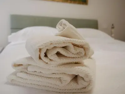 Letto o letti in una camera di Casa Andre