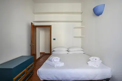 Letto o letti in una camera di Bright Last-Floor Apartment with Terrace