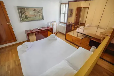 Letto o letti in una camera di Bright Last-Floor Apartment with Terrace