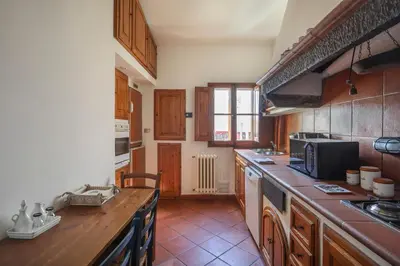Cucina o angolo cottura di Bright Last-Floor Apartment with Terrace