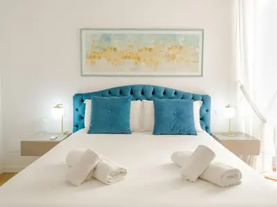 Letto o letti in una camera di Casa Leonardo