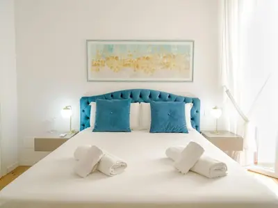 Letto o letti in una camera di Casa Leonardo