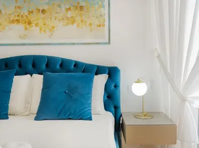 Letto o letti in una camera di Casa Leonardo