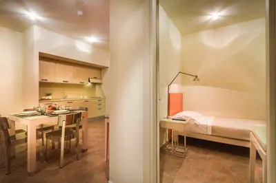 Letto o letti in una camera di PopArtment
