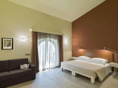 Letto o letti in una camera di PopArtment
