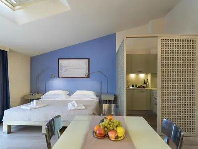 Letto o letti in una camera di PopArtment