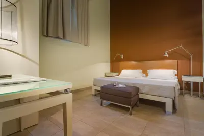 Letto o letti in una camera di PopArtment