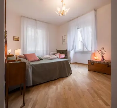 Letto o letti in una camera di Santa Felicita Apartments