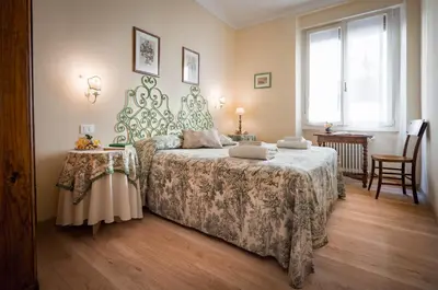 Letto o letti in una camera di Santa Felicita Apartments