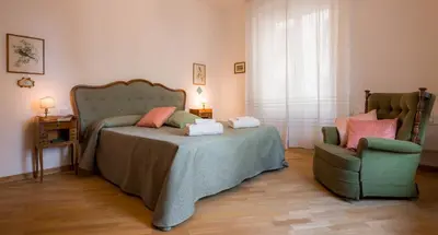 Letto o letti in una camera di Santa Felicita Apartments