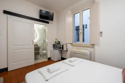 Letto o letti in una camera di Venus Suite Duomo Square