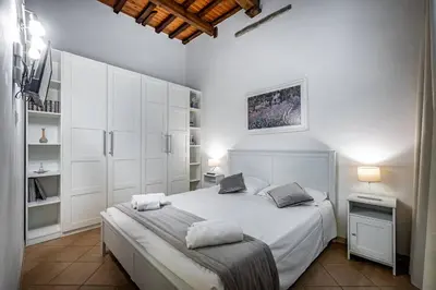 Letto o letti in una camera di Roommo Beccaria