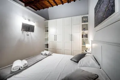 Letto o letti in una camera di Roommo Beccaria