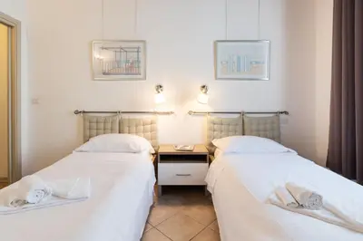 Letto o letti in una camera di Roommo Beccaria