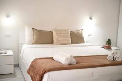 Letto o letti in una camera di A casa di Eva e Paolo
