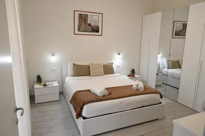 Letto o letti in una camera di A casa di Eva e Paolo