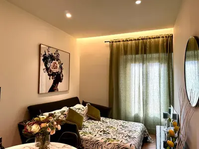 Letto o letti in una camera di Chic Mamma Charme Suite