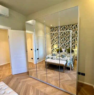 Letto o letti in una camera di Chic Mamma Charme Suite