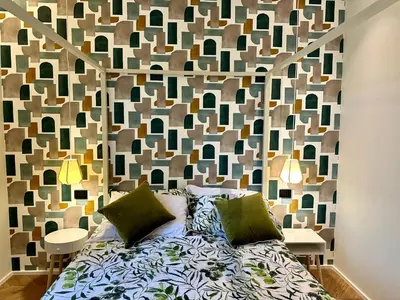 Letto o letti in una camera di Chic Mamma Charme Suite