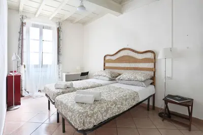 Letto o letti in una camera di Firenze Central Room For Rent