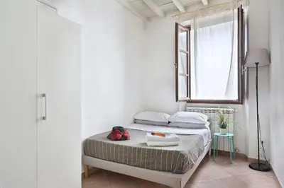 Letto o letti in una camera di Firenze Central Room For Rent