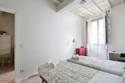 Letto o letti in una camera di Firenze Central Room For Rent