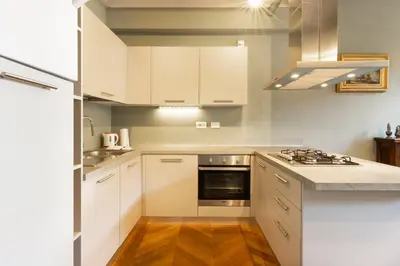 Cucina o angolo cottura di Golden Luxe - Lux Penthouse Palazzo Strozzi