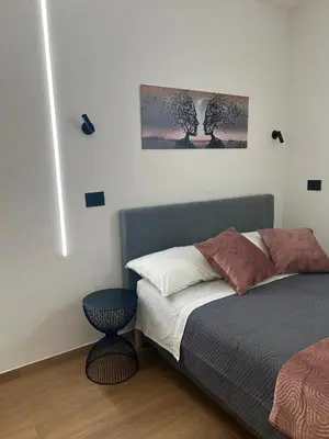 Letto o letti in una camera di Uffizi & Santa Croce - Suite romantica per coppie