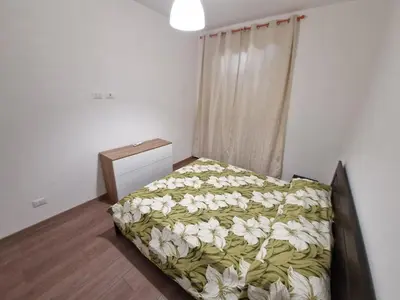 Letto o letti in una camera di Appartamento Achille