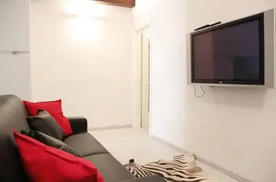 TV o dispositivi per l'intrattenimento presso Esclusivo appartamento a due passi dal Centro con Wifi e Ac