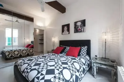 Letto o letti in una camera di Esclusivo appartamento a due passi dal Centro con Wifi e Ac
