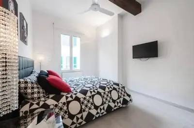 Letto o letti in una camera di Esclusivo appartamento a due passi dal Centro con Wifi e Ac