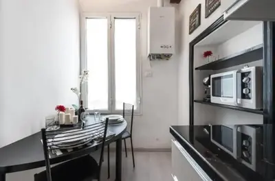Cucina o angolo cottura di Esclusivo appartamento a due passi dal Centro con Wifi e Ac