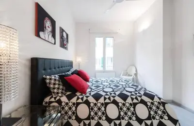 Letto o letti in una camera di Esclusivo appartamento a due passi dal Centro con Wifi e Ac