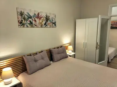Letto o letti in una camera di Cozy Apartment Near The station