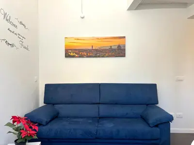 Area soggiorno di Purple Lily Apartment