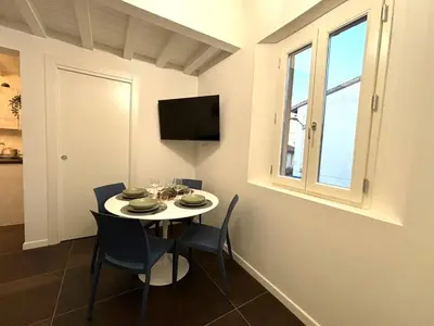 TV o dispositivi per l'intrattenimento presso Purple Lily Apartment