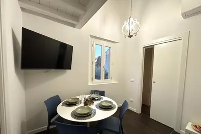 TV o dispositivi per l'intrattenimento presso Purple Lily Apartment
