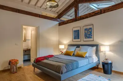 Letto o letti in una camera di Apartments Florence Borgo San Lorenzo Terrace