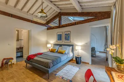 Letto o letti in una camera di Apartments Florence Borgo San Lorenzo Terrace