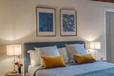 Letto o letti in una camera di Apartments Florence Borgo San Lorenzo Terrace
