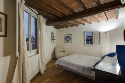 Letto o letti in una camera di Apartments Florence - Vigna Nuova Alberti