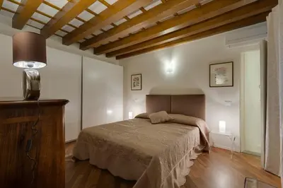 Letto o letti in una camera di Apartments Florence - Vigna Nuova Alberti