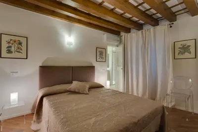 Letto o letti in una camera di Apartments Florence - Vigna Nuova Alberti