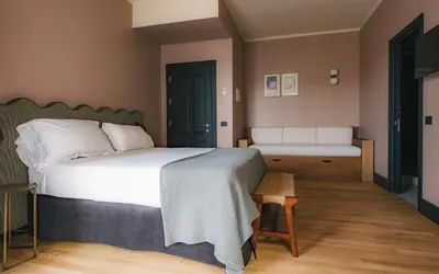 Letto o letti in una camera di c-hotels Alamanni21