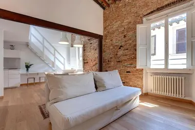 Area soggiorno di Vista sul Duomo di Firenze - Comfort e Charme nel Cuore della Città