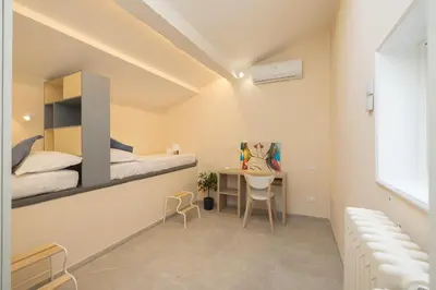 Letto o letti in una camera di Santa Croce Breath-taking Penthouse